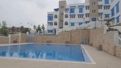 M'diq Apartment | Oceanfront Résidence Lilia Al Jabal M’diQ with Pool & Dining