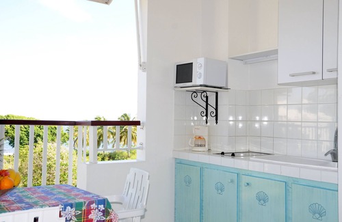 Morel Apartment | Family-Friendly Résidence Tropicale with Kitchen Amenities