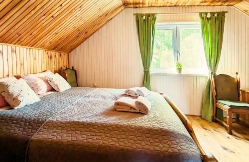 gmina Stary Dzierzgon House | Różany Ogród: Cozy Retreat by the Lake with Scenic Views
