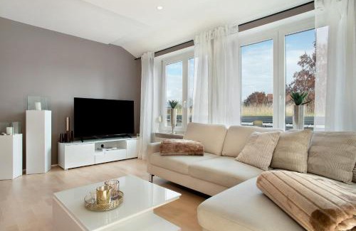 Aschach Apartment | Welcoming Römerpark Bergblick: Rated 8.9/10 & Family-Friendly