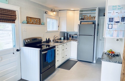 Sand Creek Cottage | Exceptional R&R Lake Front Cottage with Spa & Ocean Views