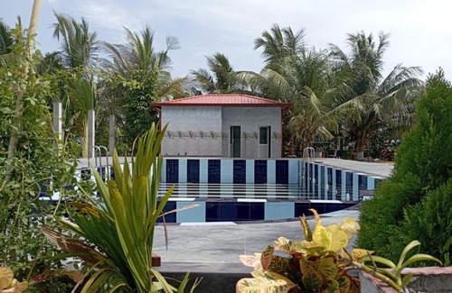 Kilinochchi Hotel | Pet Friendly R S Green Barathi Resort with Pool & Breakfast