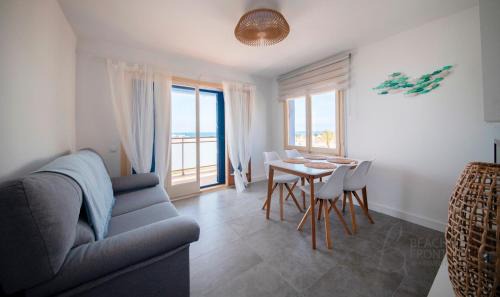 Comarruga Apartment | Oceanfront 4-Star R154 Apartment in Coma-Ruga, Perfect for Families