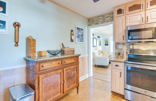 Ingles House | Scenic Lakefront Retreat with Wraparound Deck and Spa