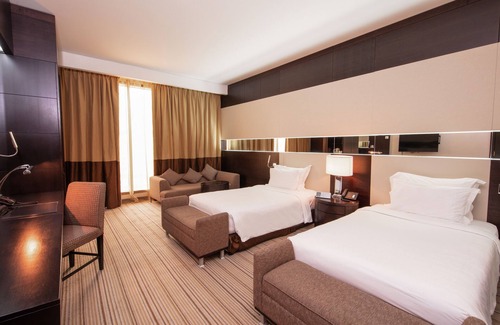 Al Muntazah Hotel | Experience the Elegance of Radisson Blu Hotel Doha