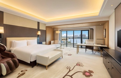 Caidian District Hotel | Stylish Radisson Blu Hotel Wuhan ETD Zone with Pool Access
