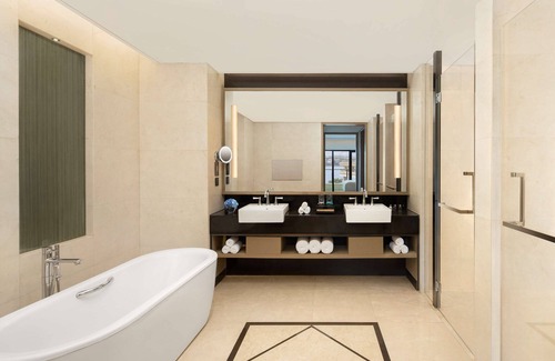 Caidian District Hotel | Stylish Radisson Blu Hotel Wuhan ETD Zone with Pool Access