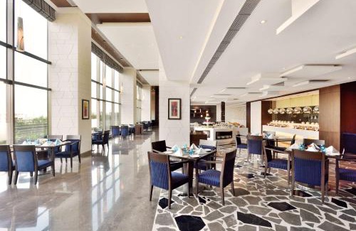 Phase 1 Hotel | Elegant Stay at Radisson Blu Pune Hinjawadi with Spa & Pool
