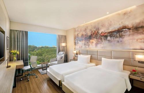 Andheri East Hotel | Explore Radisson Mumbai Andheri MIDC: Pool & Ocean Views