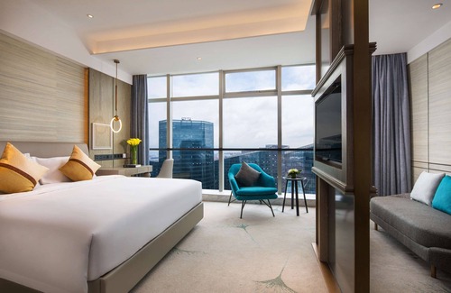 Beilun Hotel | Discover Radisson Ningbo Beilun: Family-Friendly Retreat