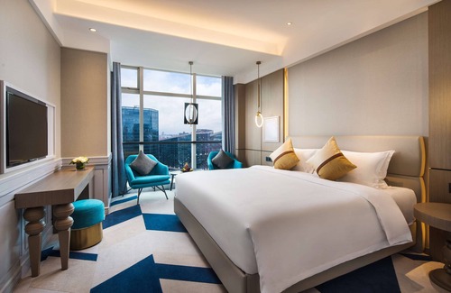 Beilun Hotel | Discover Radisson Ningbo Beilun: Family-Friendly Retreat