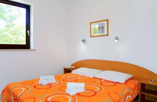 Sveti Vid Dobrinjski Apartment | Radmila by Interhome: Oceanfront Oasis with Spa & Pool