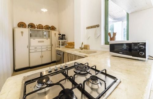 Ceglie Messapica House | Elegantly Set Retreat Amidst Olive Trees and Cacti