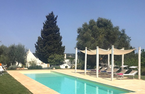 Ceglie Messapica House | Elegantly Set Retreat Amidst Olive Trees and Cacti