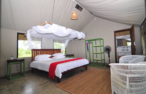 Chikombe Cabin | Discover Rafiki Safari Camp: Family-Friendly Retreat