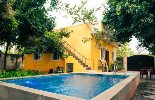 Moratandi Villa | Relaxing Rainbow Homestay with Pool in Auroville