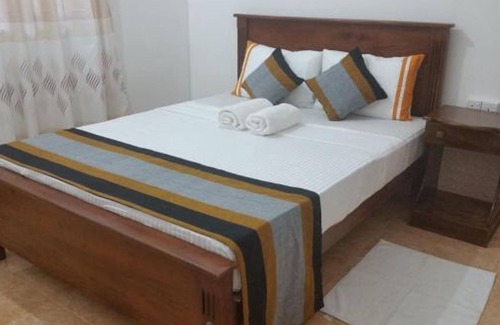 Anuradhapura House | Cozy Rainbow Tourist Rest: Family-Friendly with Dining Options