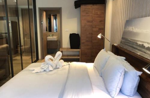 Cha-am Apartment | Discover Raincondo Ampere: Oceanfront Poolside Retreat
