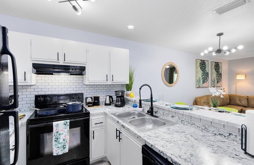 Titusville Apartment | *Rainforest Realm* *NASA*, Pool, BBQ, Gym, & Patio