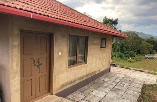 Sakleshpur House | Eco-Friendly Retreat at RainTree EcoStay with Pool & Dining