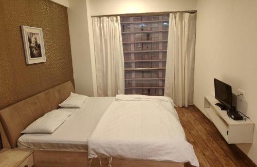 Surat Apartment | Stay at Rajhans Belliza Aashiana: Family & Pet Friendly