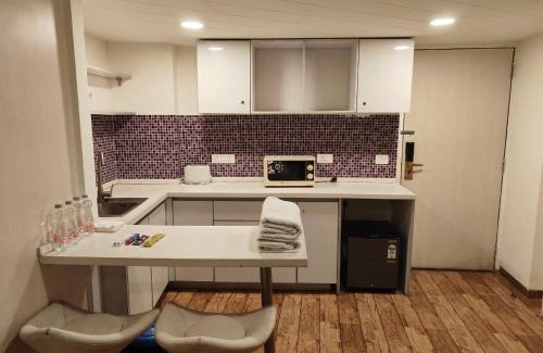 Surat Apartment | Stay at Rajhans Belliza Aashiana: Family & Pet Friendly