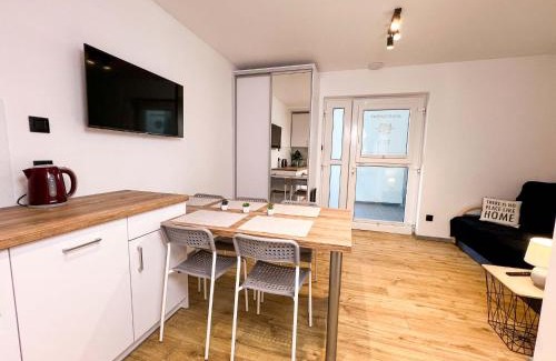 Poddabie Apartment | RAJSKA PLAZA Poddąbie Basen odkryty brodziki Basen kryty Plac zabaw Animacje