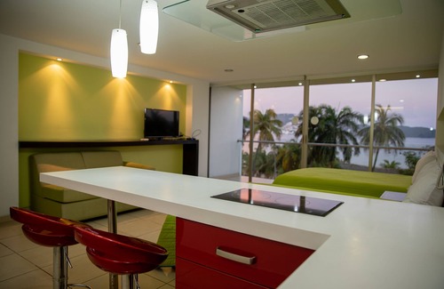 Hornos Hotel | Discover Oceanfront Comfort at Ramada by Wyndham Acapulco