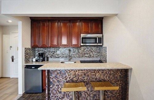 Flushing Chinatown Hotel | Eco-Friendly Ramada by Wyndham Flushing with Breakfast Included