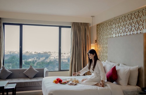 Vidhyadhar Nagar Hotel | Explore Ramada by Wyndham Jaipur North with Pool & Dining