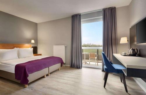Schwaig Hotel | Comfortable Stay at Ramada by Wyndham München Airport