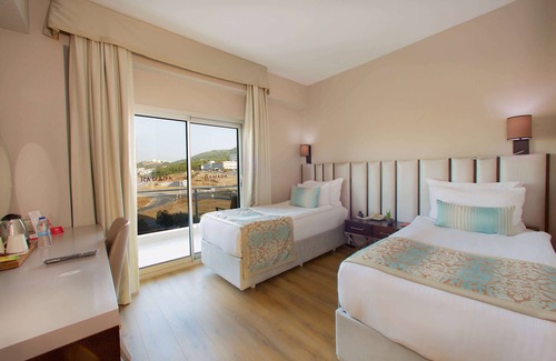 Soma Hotel | Relax at Ramada by Wyndham Soma: 4-Star Stay with Spa & Pool