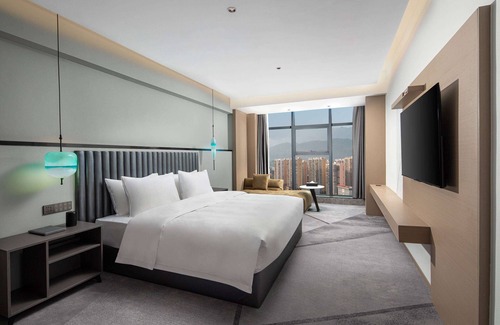 Enshi Hotel | Discover Ramada Encore By Wyndham Enshi: Family-Friendly Stay