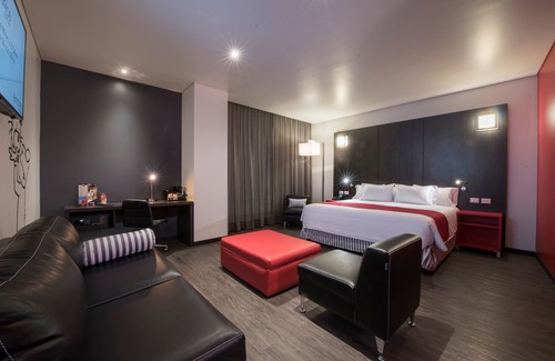Coronango Hotel | Discover Ramada Encore Puebla: 4-Star Retreat with Pool & Spa