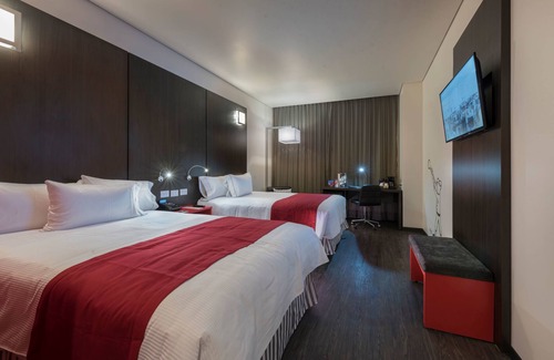 Coronango Hotel | Discover Ramada Encore Puebla: 4-Star Retreat with Pool & Spa