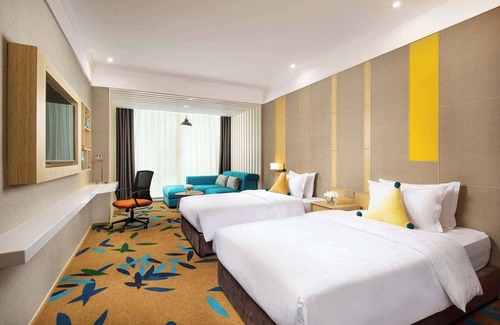 Lanshan District Hotel | Exceptional Ramada Encore Wyndham Linyi: 4-Star Comfort Awaits