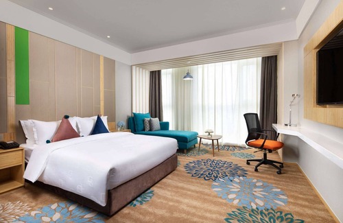 Lanshan District Hotel | Exceptional Ramada Encore Wyndham Linyi: 4-Star Comfort Awaits
