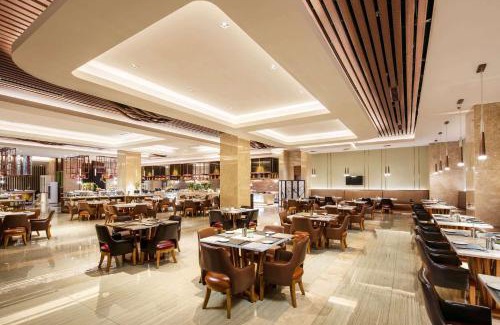 Mudan District Hotel | Top-Rated Ramada Heze with Pool and Ocean View Amenities