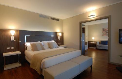 Turro Hotel | Stylish Ramada Plaza Milano: Pet-Friendly & Oceanfront Escape