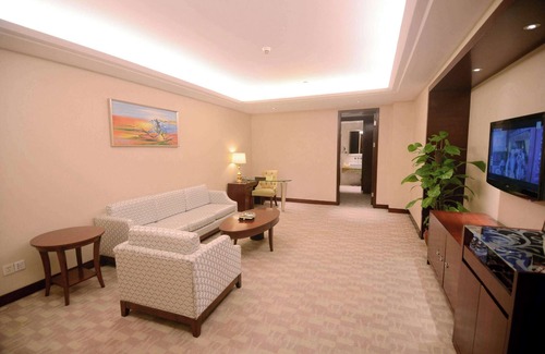 Songgang Hotel | Convenient Stay at Ramada Shenzhen Baoan with Pool & Spa