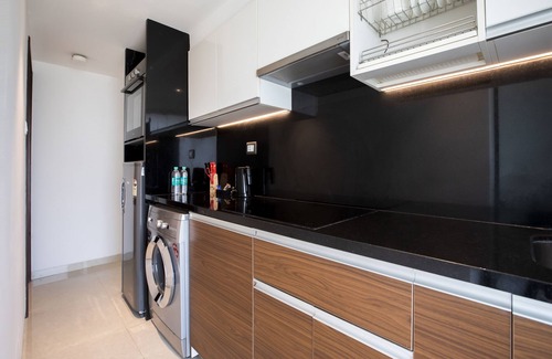 Khar Hotel | Welcome to Ramee Techome: Poolside Retreat with Kitchen