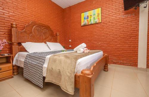 Buriti Alegre Villa | Discover Rancho Colonial: Suites with Lake Access for All