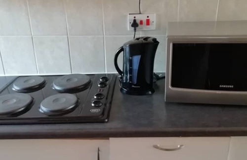 Molepolole Apartment | Discover Ranks Apartments: Family-Friendly Retreat with Dining