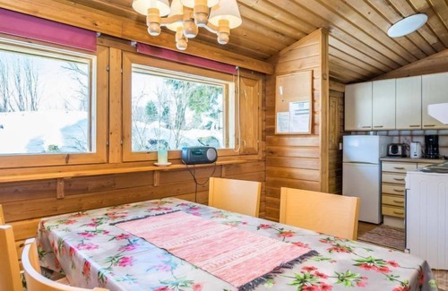 Pieksamaki House | Escape to Rantapirtti: Scenic Lake Views & Spa Retreat