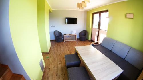 Myczkow Cabin | Oceanfront Family Retreat at Rapiszka - Rated 9.8/10