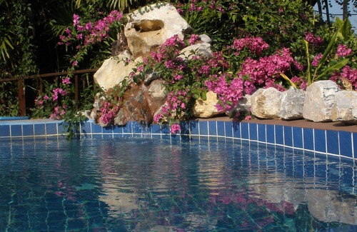 Pa Sang Apartment | Enchanting Rapunzel's Tower with Pool & Family-Friendly Kitchen