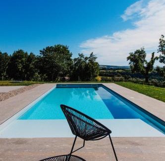 Orvieto Villa | Elegant Rara Factory Design House with Oceanfront Pool