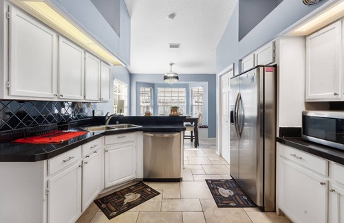 Ocoee House | Beautiful Heated Pool House Steps from Downtown Orlando