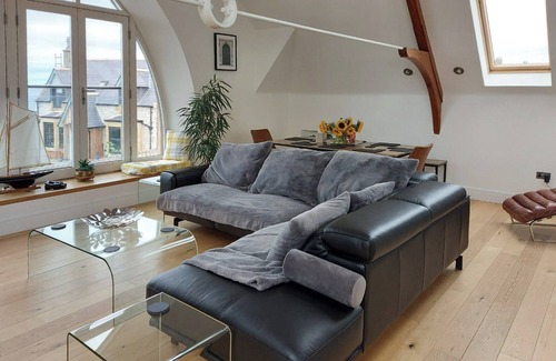 Buckie Cottage | Enchanting Converted Parish Hall with Ocean Views
