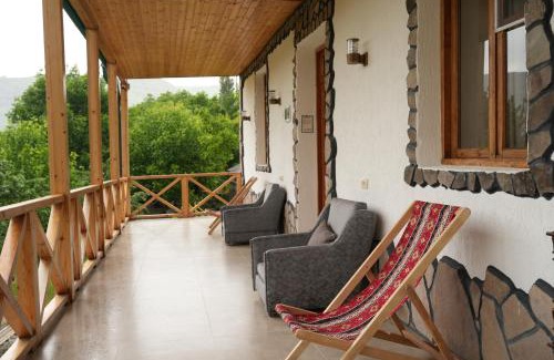 T'ba Hotel | Relax at Rati's Oda: Oceanfront Pool & Family-Friendly Stay